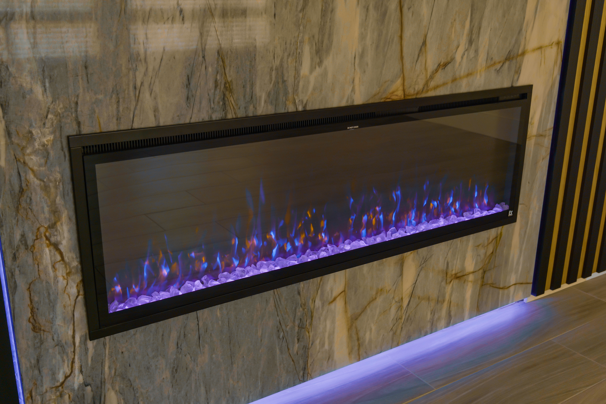 Aflamo Majestic 65 electric fireplace displaying a vibrant flame simulation.