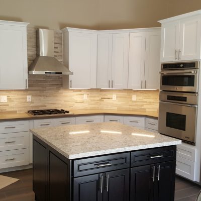 Mesa kitchen two-tone cabinets white uppers dark island granite countertops