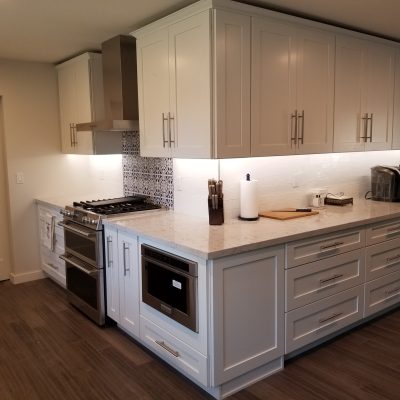 Mesa kitchen white shaker cabinets light countertops wood-look tile floor