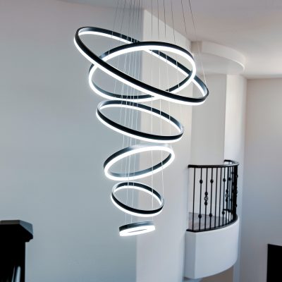 Unique spiral pendant light with eight illuminated circular rings.